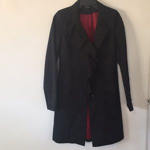 Black ruffled trench coat